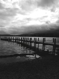 Pier over sea against sky