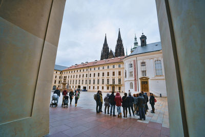 Group of people in front of building