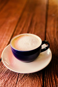 Close-up of coffee cup on table