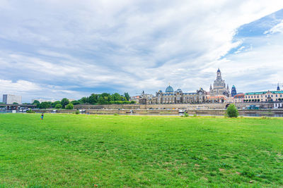 View of buildings against cloudy sky