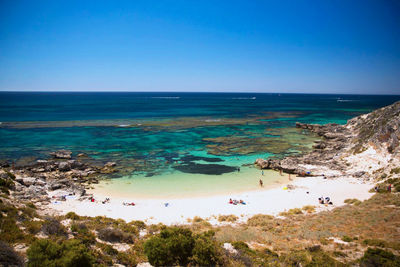 High angle view of beach against blue sky