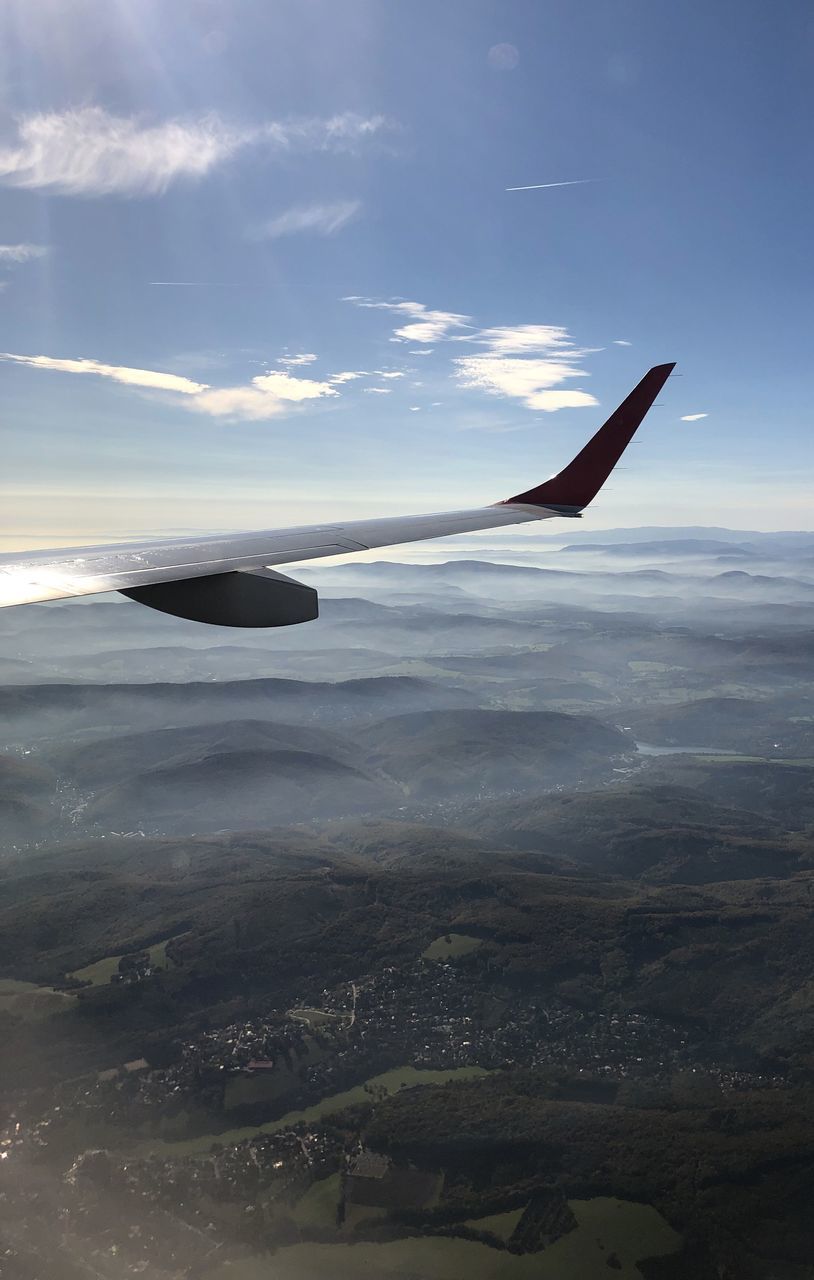 AIRPLANE FLYING IN SKY