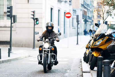 Motorcycle parked on street in city