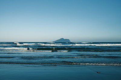 Scenic view of sea against clear sky