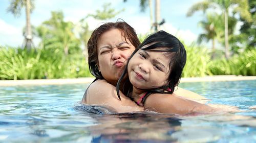 Portrait of woman in swimming pool