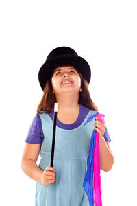 Portrait of happy girl wearing hat against white background