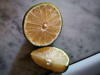High angle view of lemon slice on table