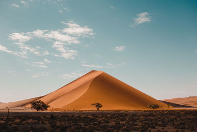 Scenic view of desert against sky