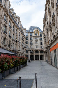 Courtyard in paris, france surrounded with historic houses