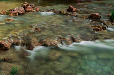 Close-up of rocks in sea