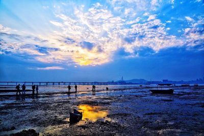 Scenic view of sea at sunset