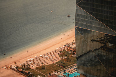 High angle view of beach by buildings in city