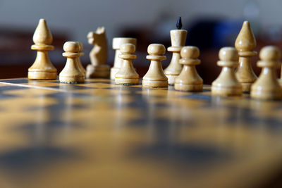 Close-up of chess pieces on board