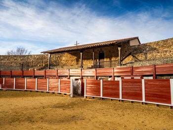 View of brick wall against sky