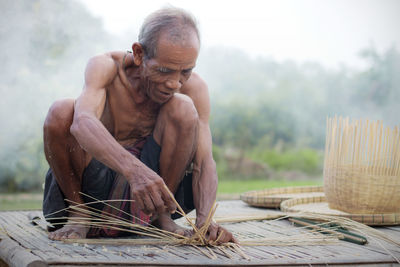 Man working in basket