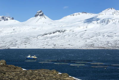 Fishing cutter in the north fjords of iceland, wintertime