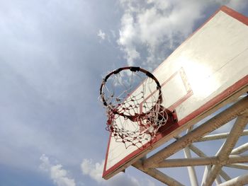 Low angle view of ferris wheel against sky