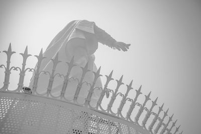 Low angle view of a sculpture of building against clear sky