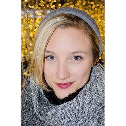 Close-up portrait of smiling young woman