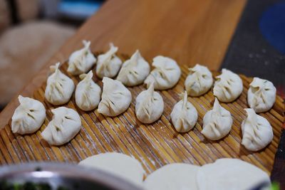 High angle view of chopped bread on cutting board