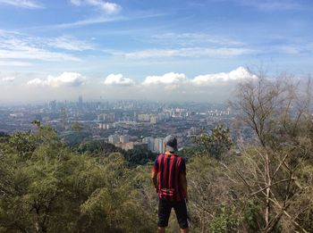 Rear view of man standing in park