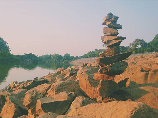 VIEW OF ROCKS IN WATER