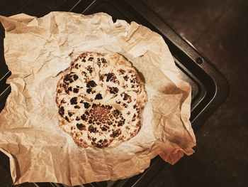 High angle view of bread on paper