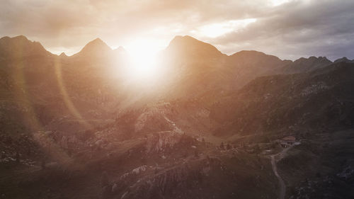 Scenic view of mountains against sky during sunset