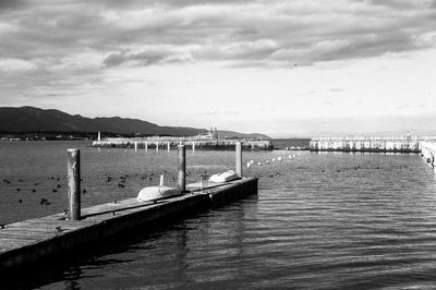 Pier over sea against sky