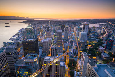 High angle view of city at sunset