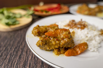 Close-up of food in plate on table