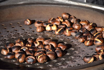 Close-up of chestnuts in container