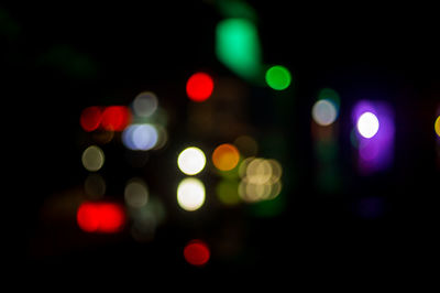 Defocused image of illuminated lights at night