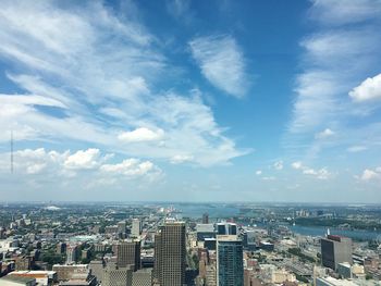 High angle view of buildings in city against sky