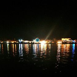 Reflection of illuminated buildings in water