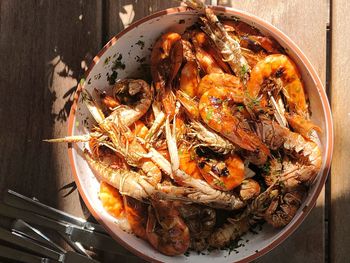 High angle view of shrimps served in bowl on table