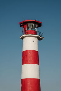 Low angle view of lighthouse against clear sky