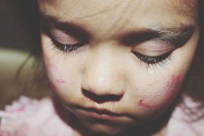 Close-up of girl with face paint