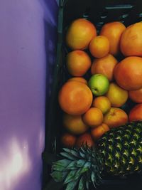 High angle view of orange fruits in market