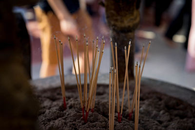 Close-up of incense sticks in temple