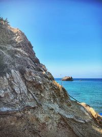 Scenic view of sea against clear blue sky