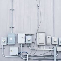 Close-up of meter boxes on wall