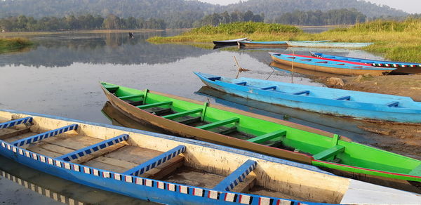 High angle view of boats moored at lake