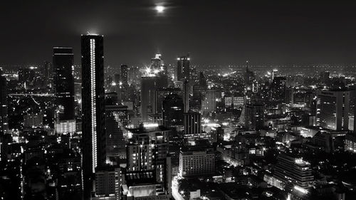 Illuminated cityscape at night