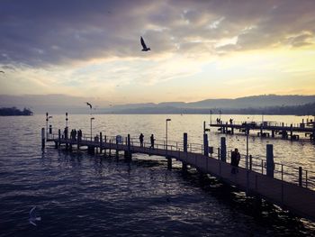 Scenic view of sea against sky at sunset