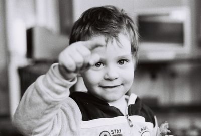 Portrait of smiling boy at home