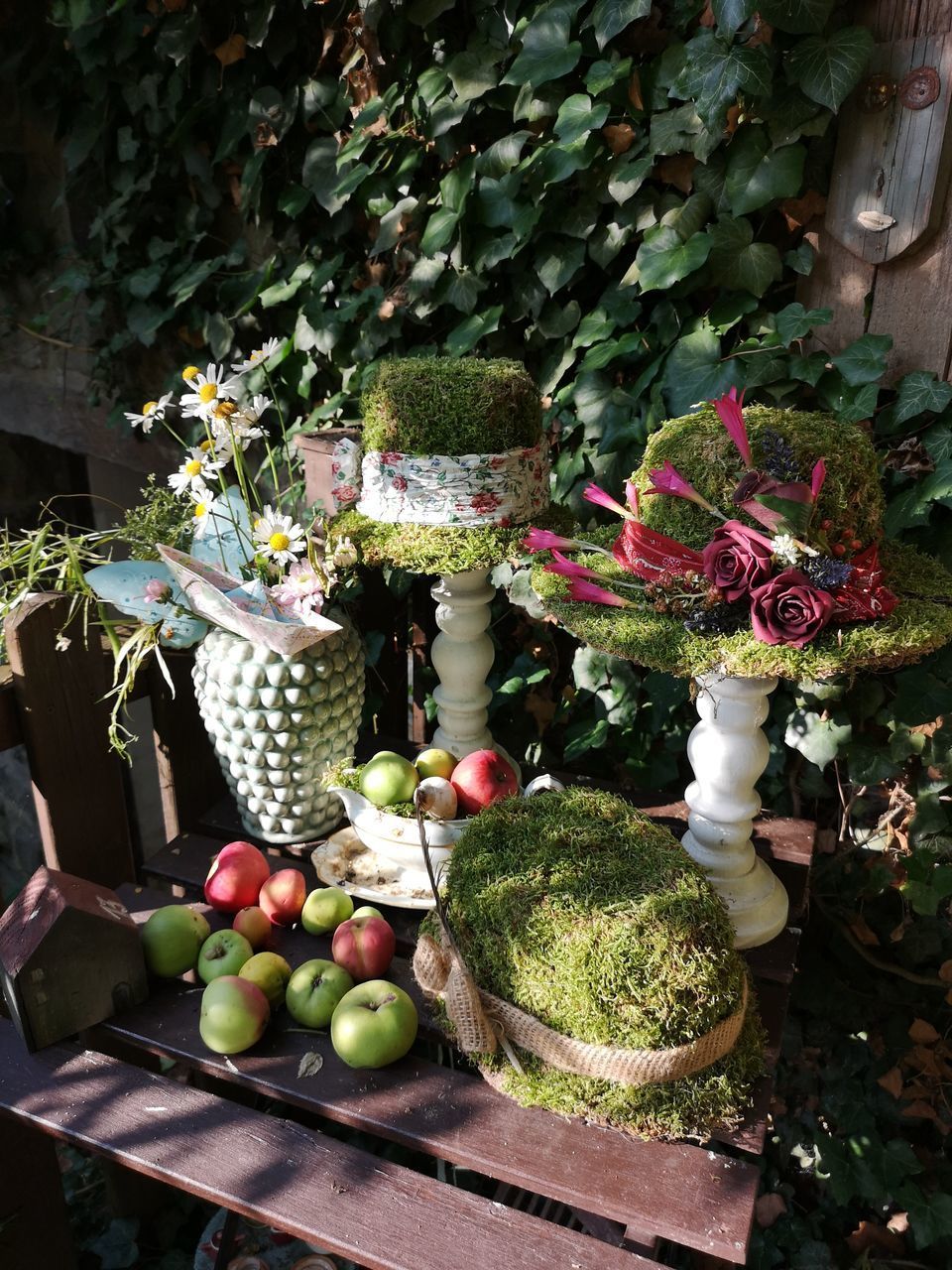 FRUITS ON TABLE IN BACKYARD