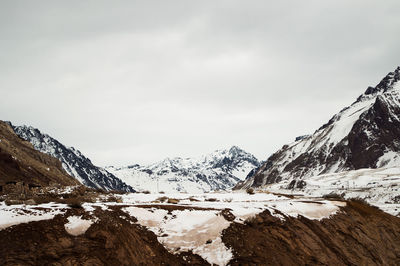 Snow covered mountain against sky