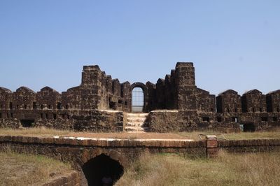 Old ruins of building against clear sky
