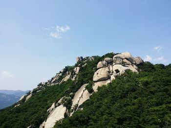 Scenic view of rocky mountains against sky